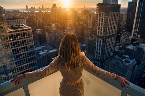 Woman on hotel balcony